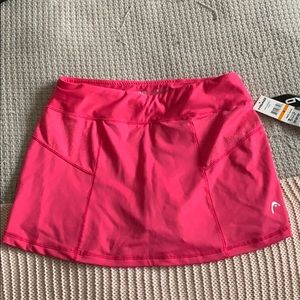 BNWT Head pink tennis skirt w/ built in shorts.